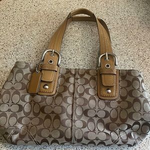 Coach signature bag. Light tan straps.